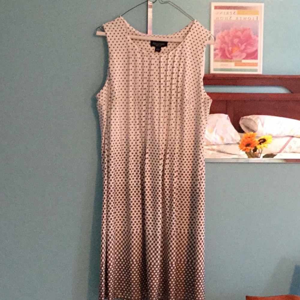Gold polka dots with cream background. Polyester
